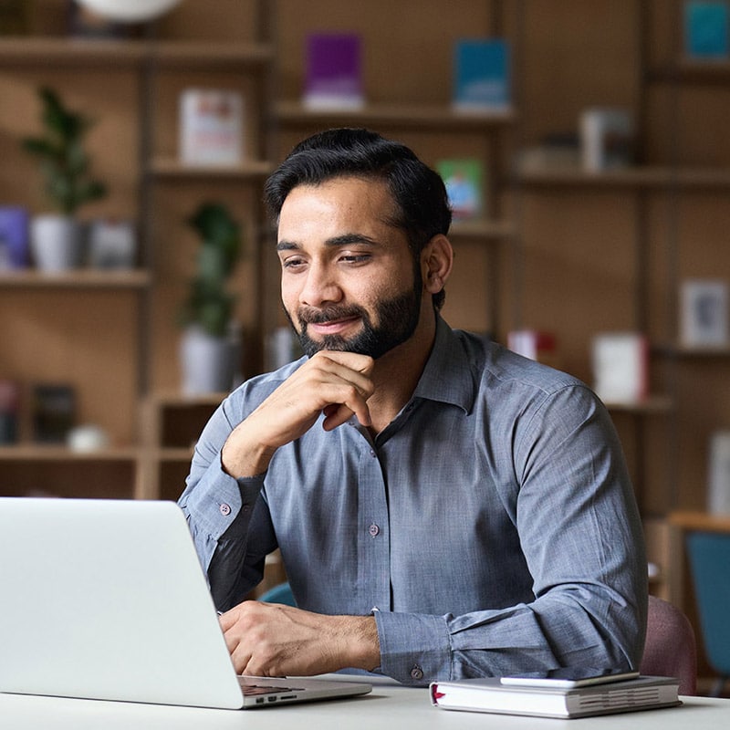 Man in front of laptop